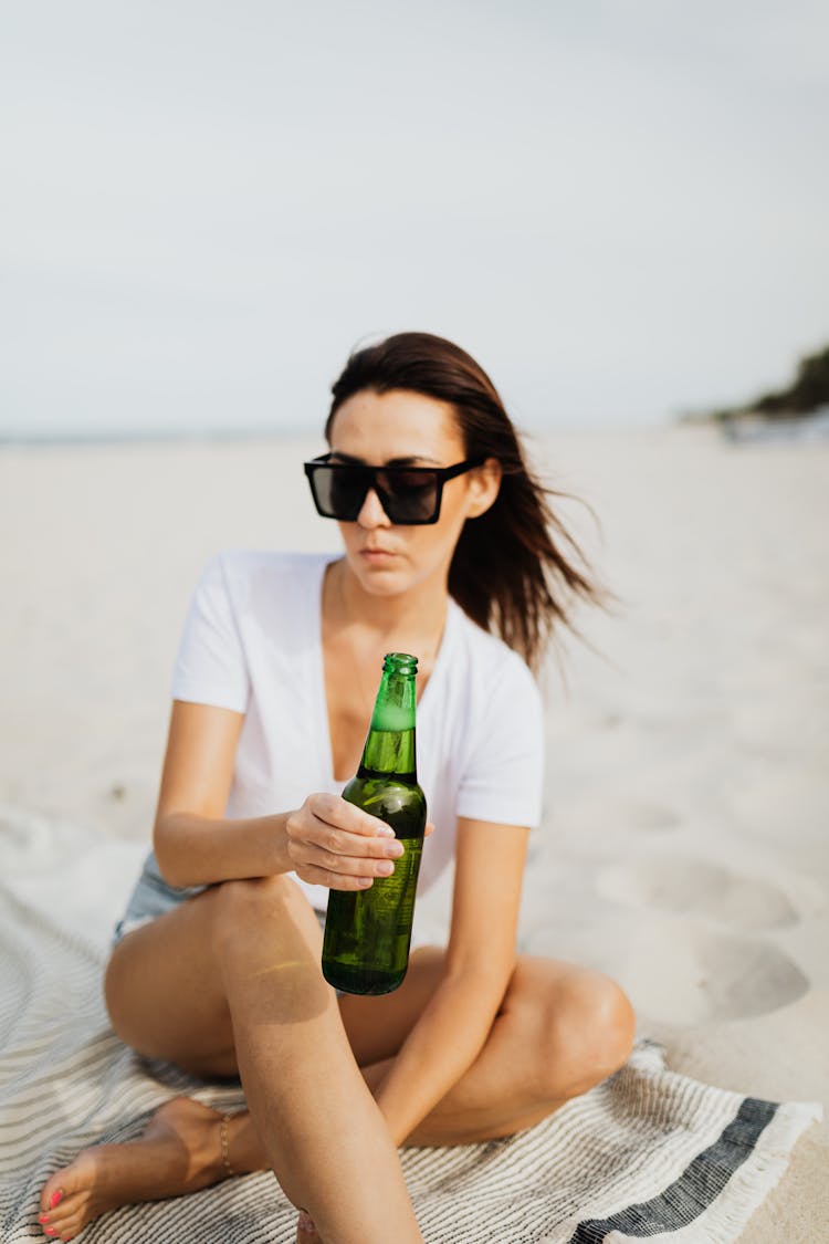 Woman In White Crew Neck T-shirt With Sunglasses Holding A Bottle Of Beer 