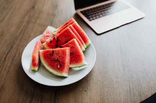 Free Sliced Watermelon on a White Plate Stock Photo