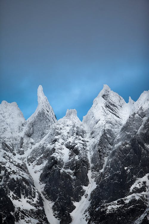 Snow Capped Mountains Under Blue Sky