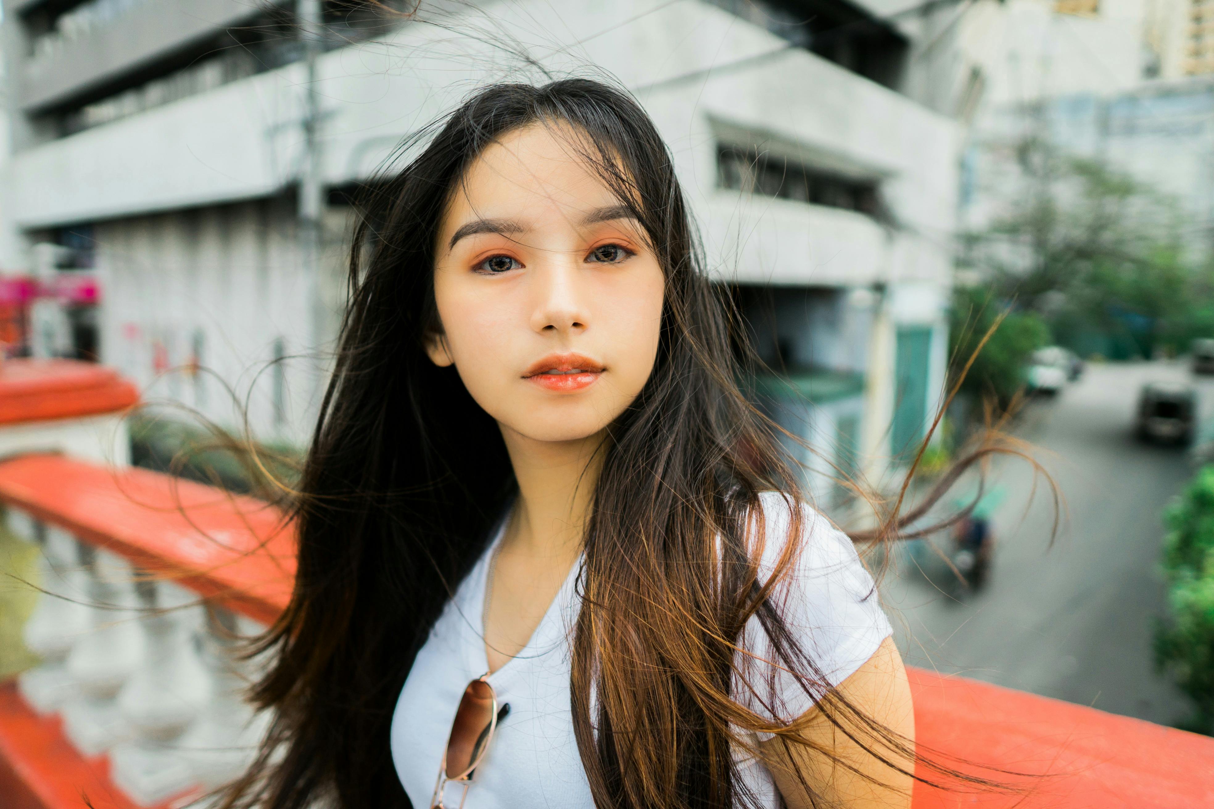 beautiful woman with long hair in a bridge