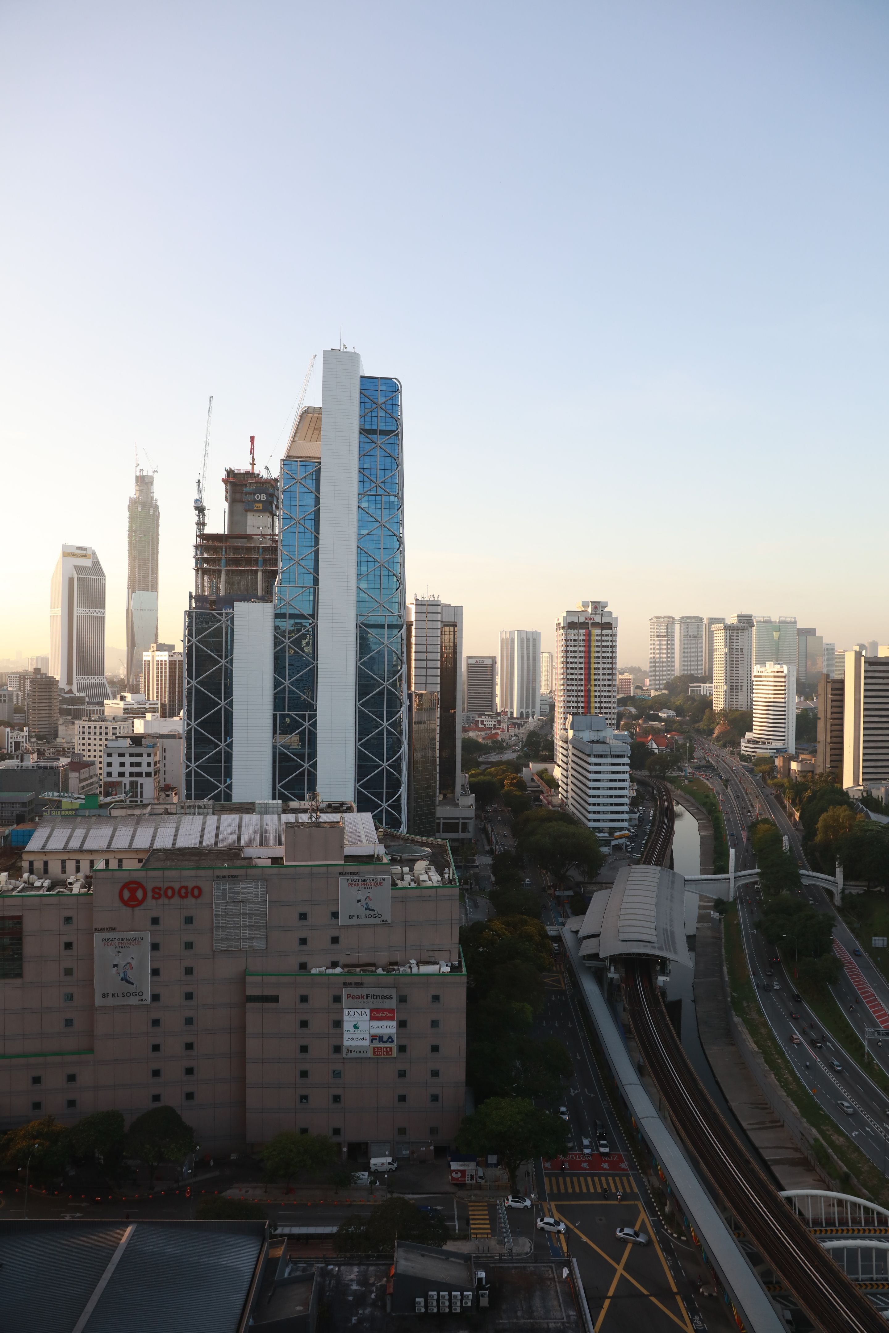Aerial View of Roads Surrounded by High Rise Buildings · Free Stock Photo