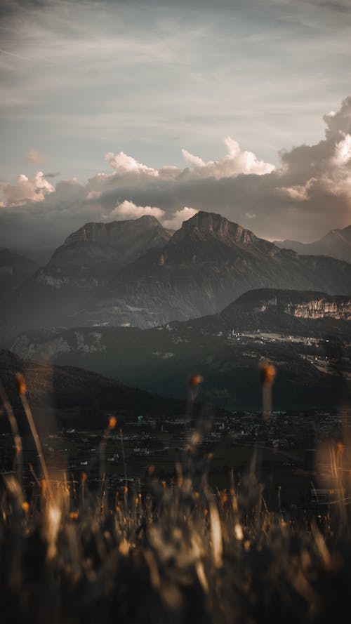 Mountains Under White Clouds