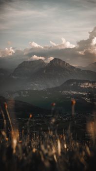 Breathtaking view of mountains under a moody sky, perfect for nature lovers.