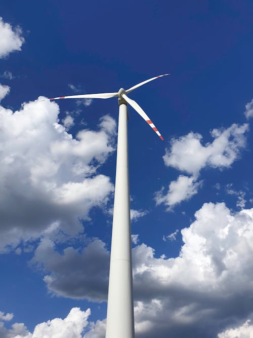 Free White Wind Turbine Under Blue and Cloudy Sky Stock Photo