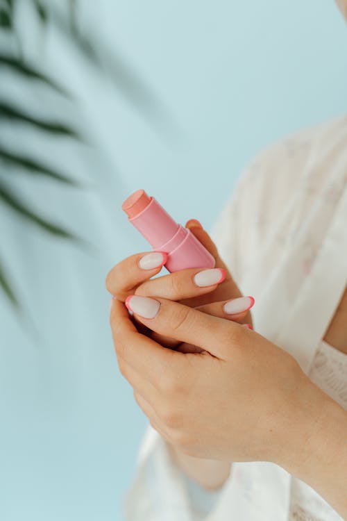 Free Person Holding Pink Lipstick Stock Photo