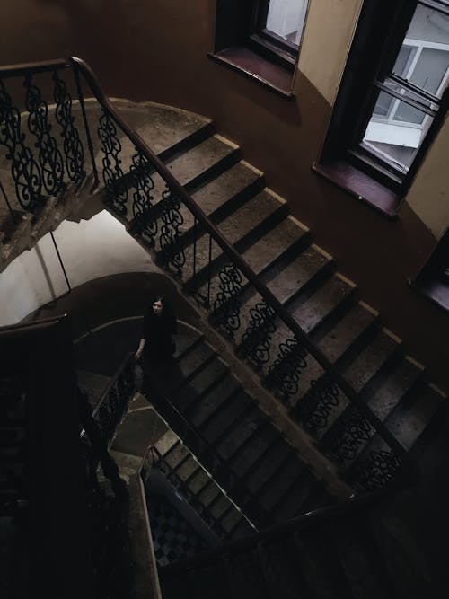 Staircase With Black Metal Railings