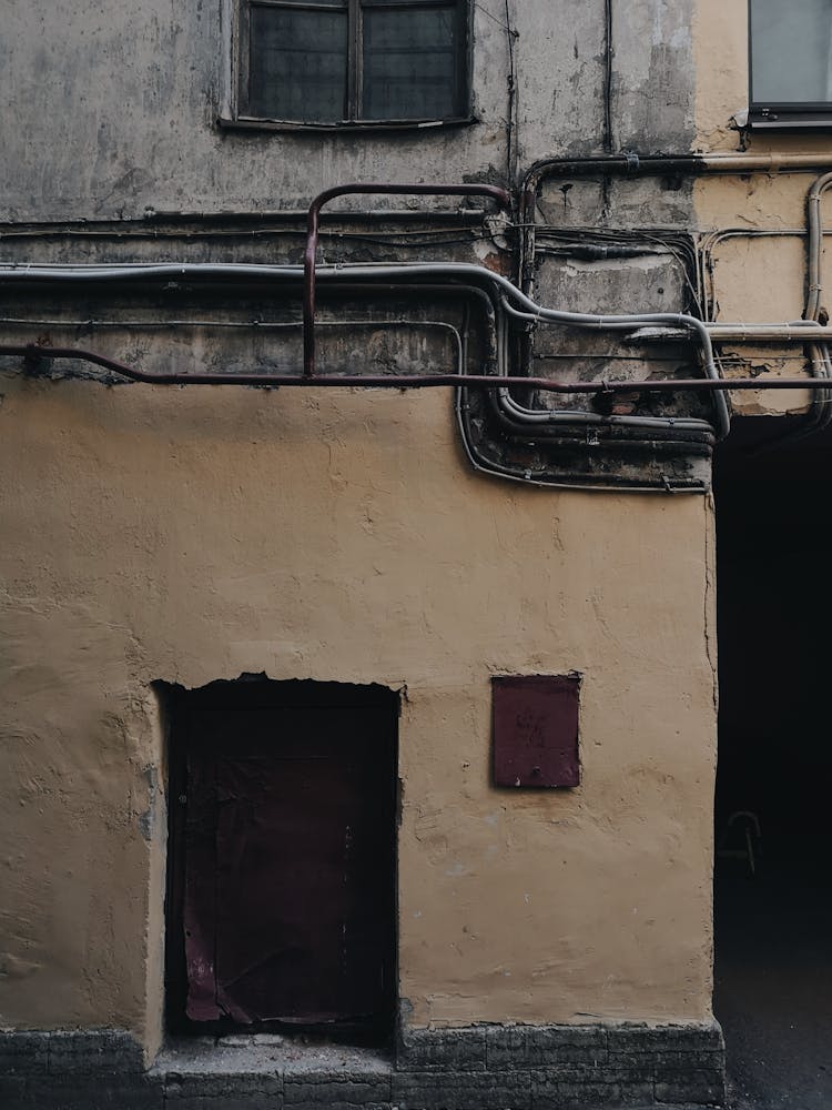 Electric Wires On The House Wall