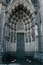 Catholic cathedral door decorated with medieval statues