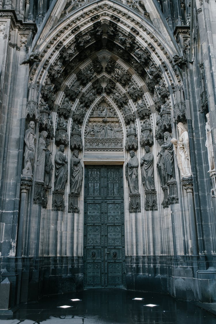 Catholic Cathedral Door Decorated With Medieval Statues