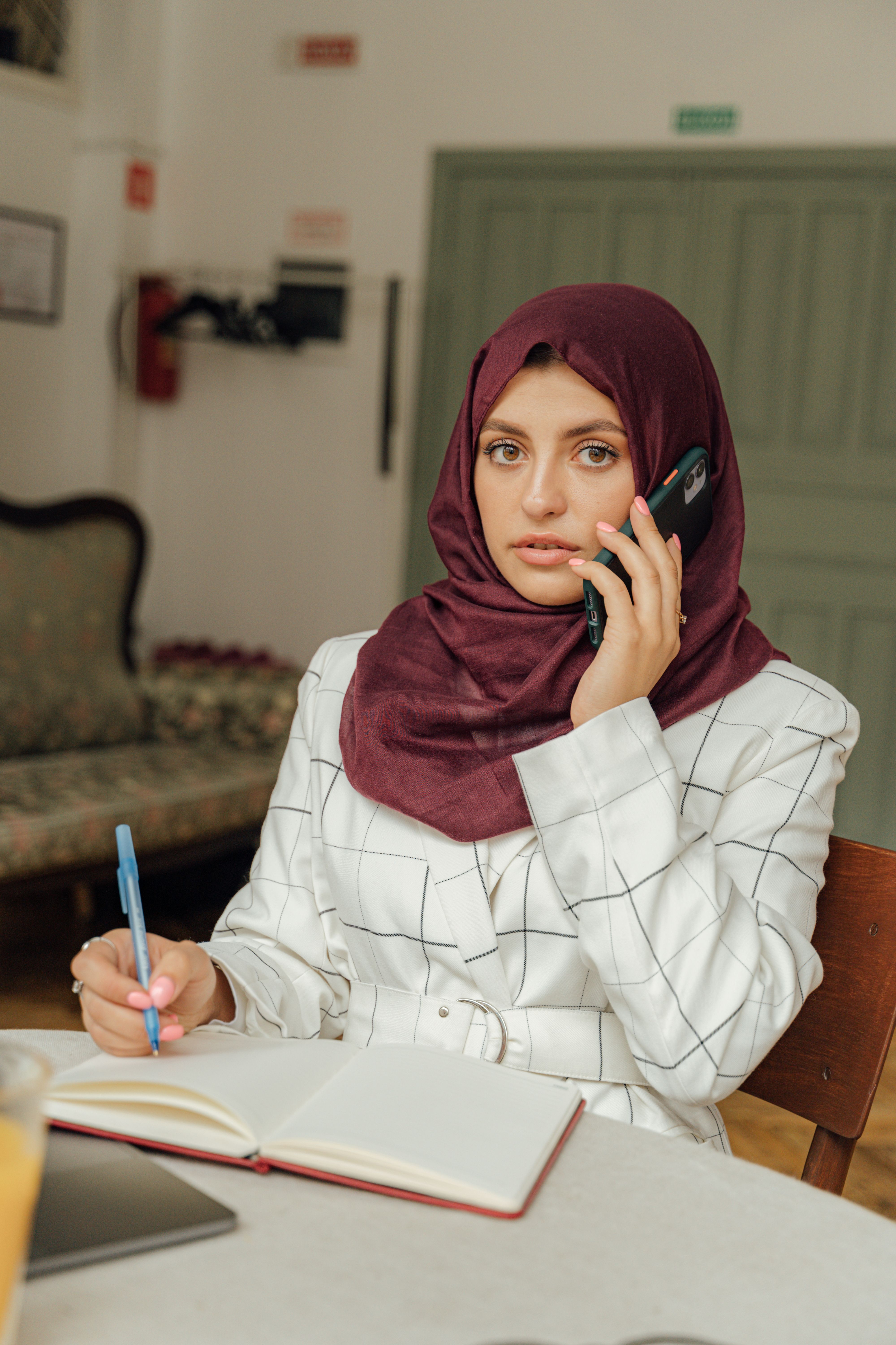 A Woman Talking on the Phone · Free Stock Photo