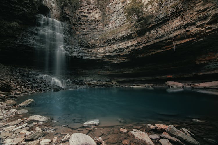 Waterfall Cascading In Cave