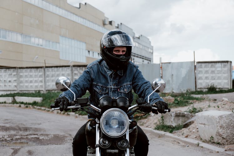 A Man Riding A Motorcycle