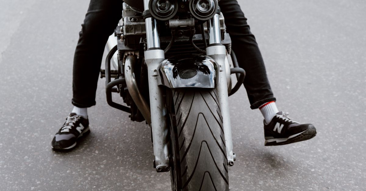 Person Rider A Person Riding on Black Motorcycle · Free Stock Photo