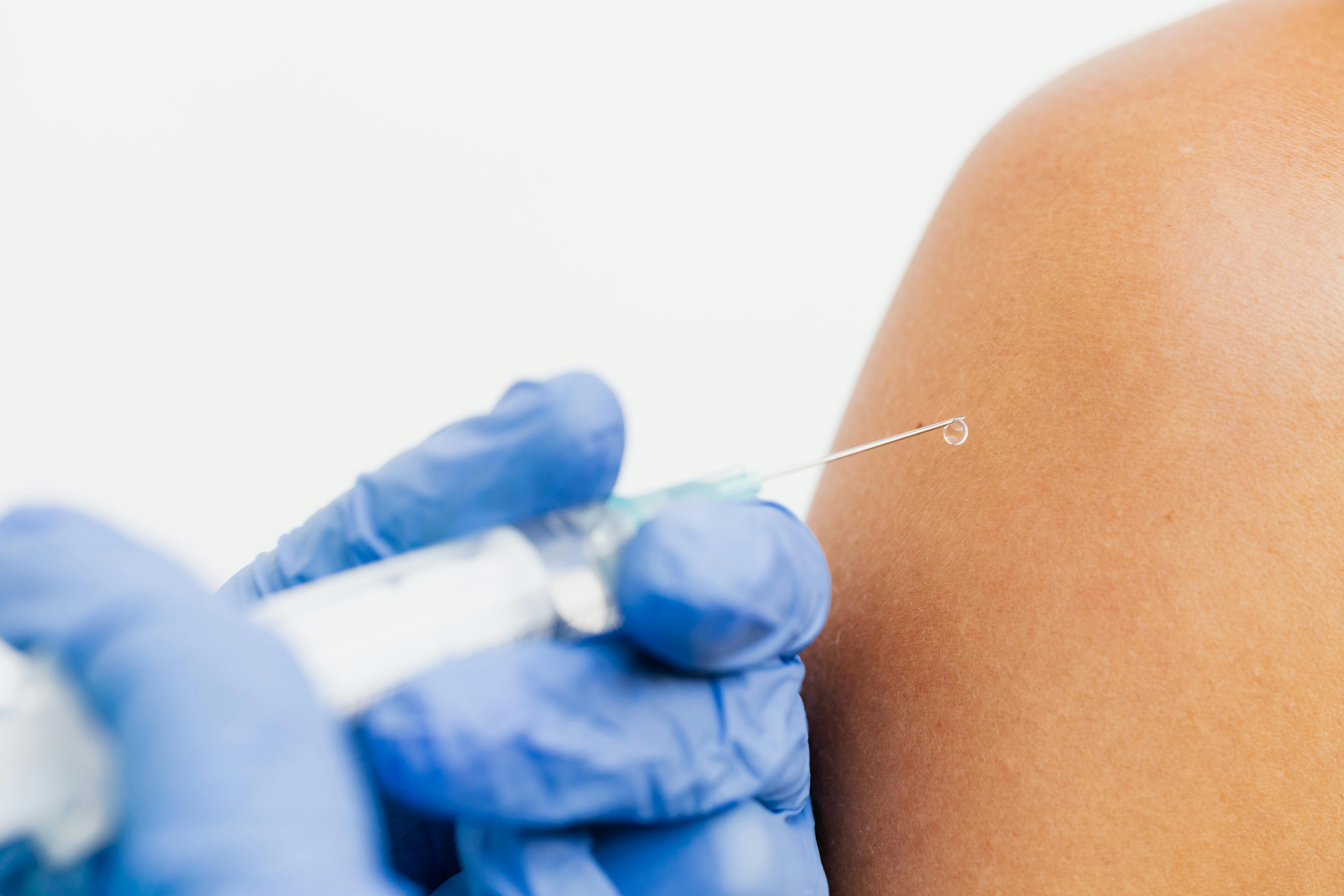 Injection on the Arm of a Person · Free Stock Photo