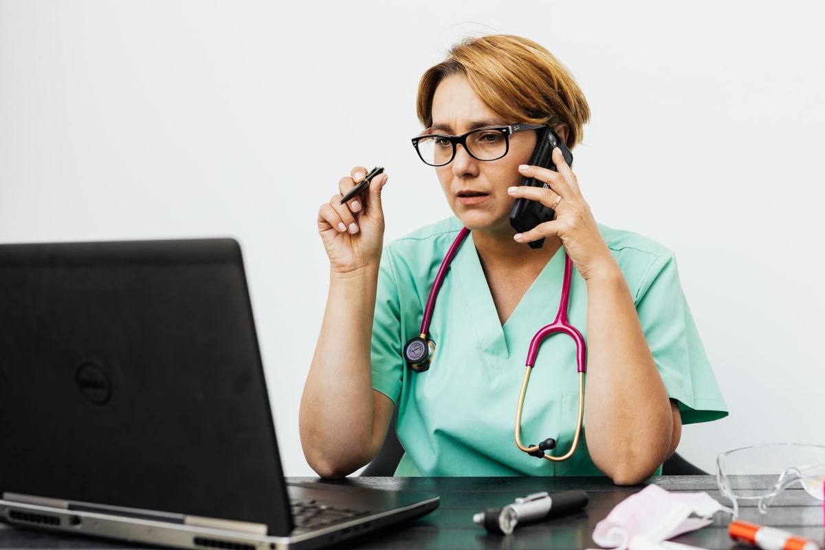 Doctor using laptop for medical education