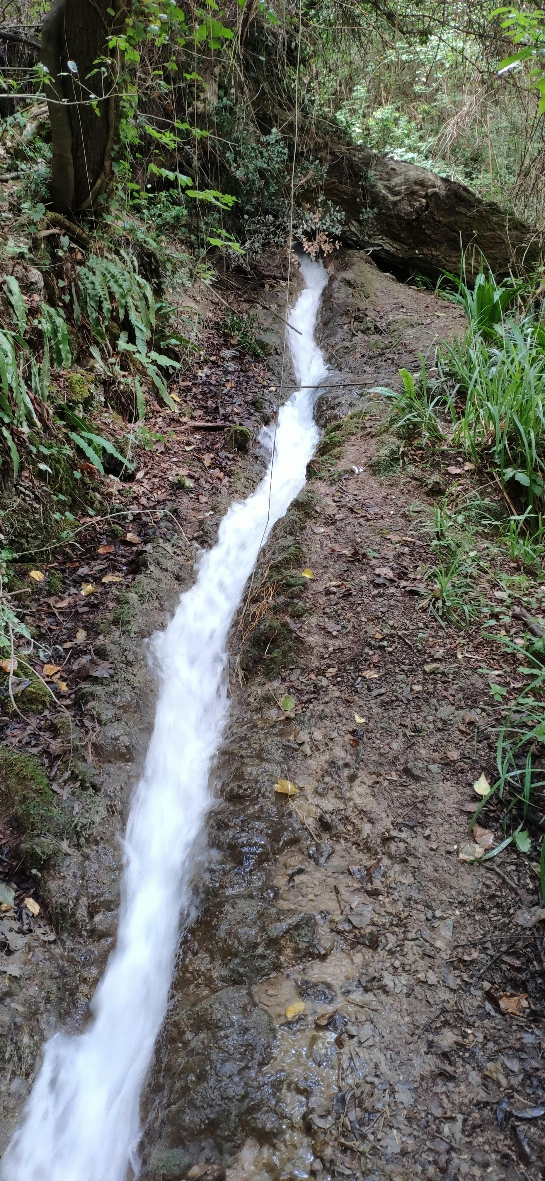 Operator at a multi-screen console illustrating combat information center operations