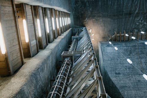 Metal construction inside of salt mine with lamps