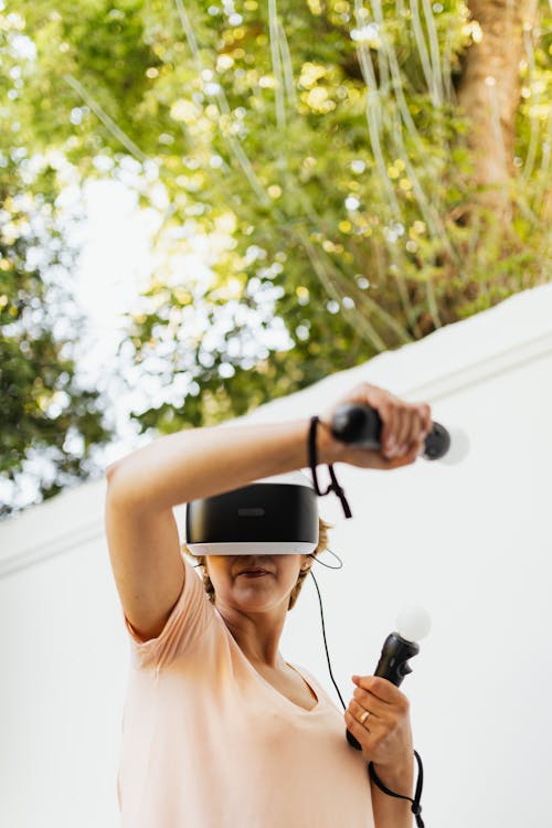 Woman Playing Virtual Reality Game