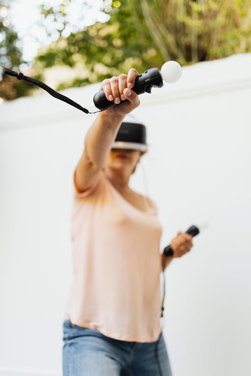 A Woman Playing Virtual Reality Game