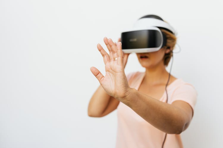 A Woman Wearing VR Goggles 