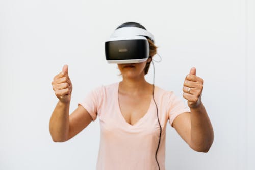 A Woman Wearing Virtual Reality Goggles