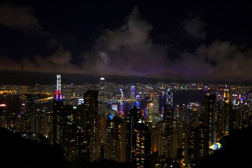 Free Breathtaking view of Hong Kong's illuminated skyline showcasing a vibrant urban nightscape. Stock Photo