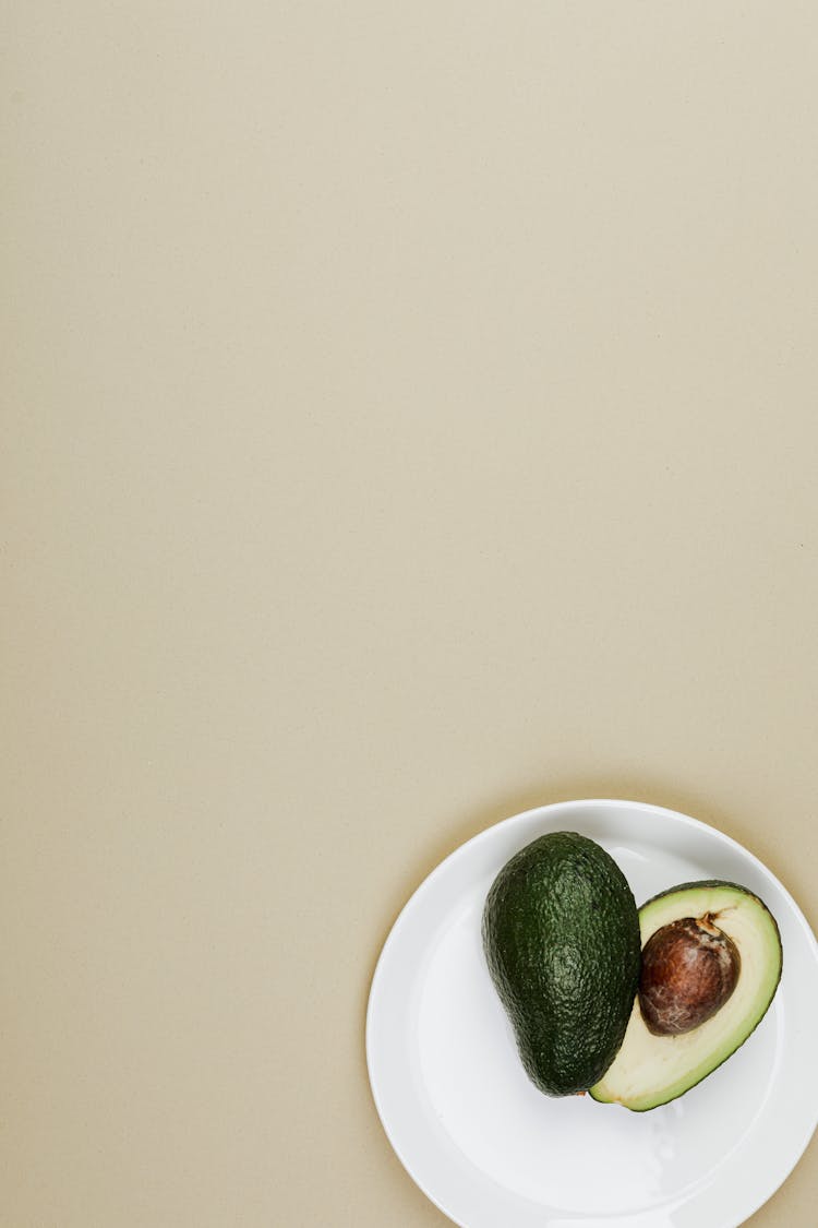 Sliced Green Avocado On A Plate