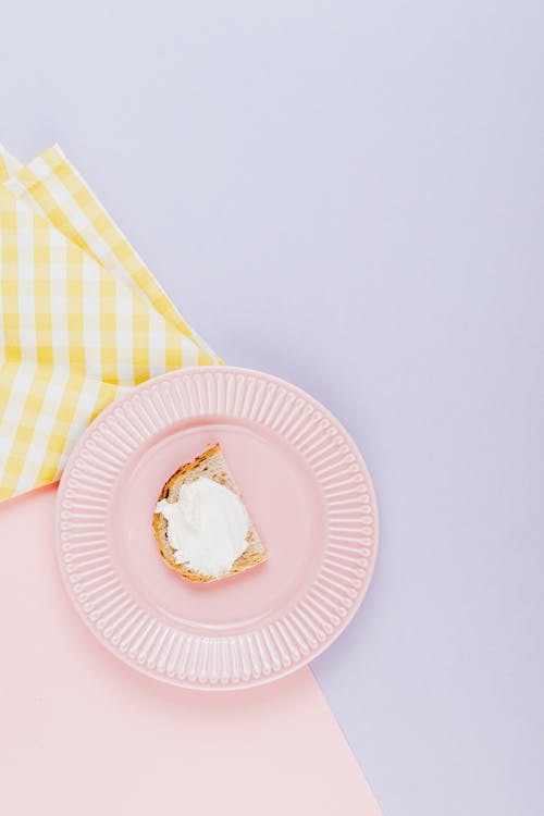 White and Yellow Striped Paper Plate