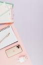 Gold Iphone 6 on White Notebook
