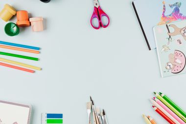Craft supplies arranged on pale blue, photo by Kaboompics.com on Pexels