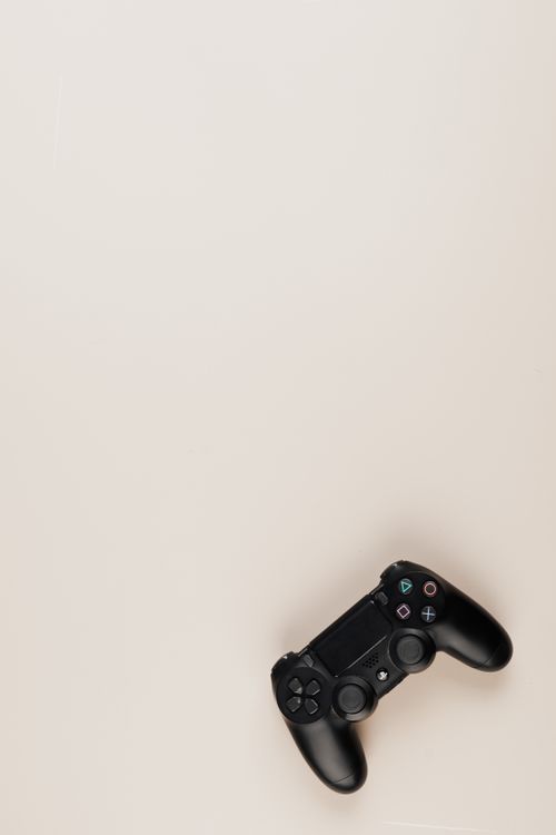 Flat Lay Shot of a Video Game Controller · Free Stock Photo