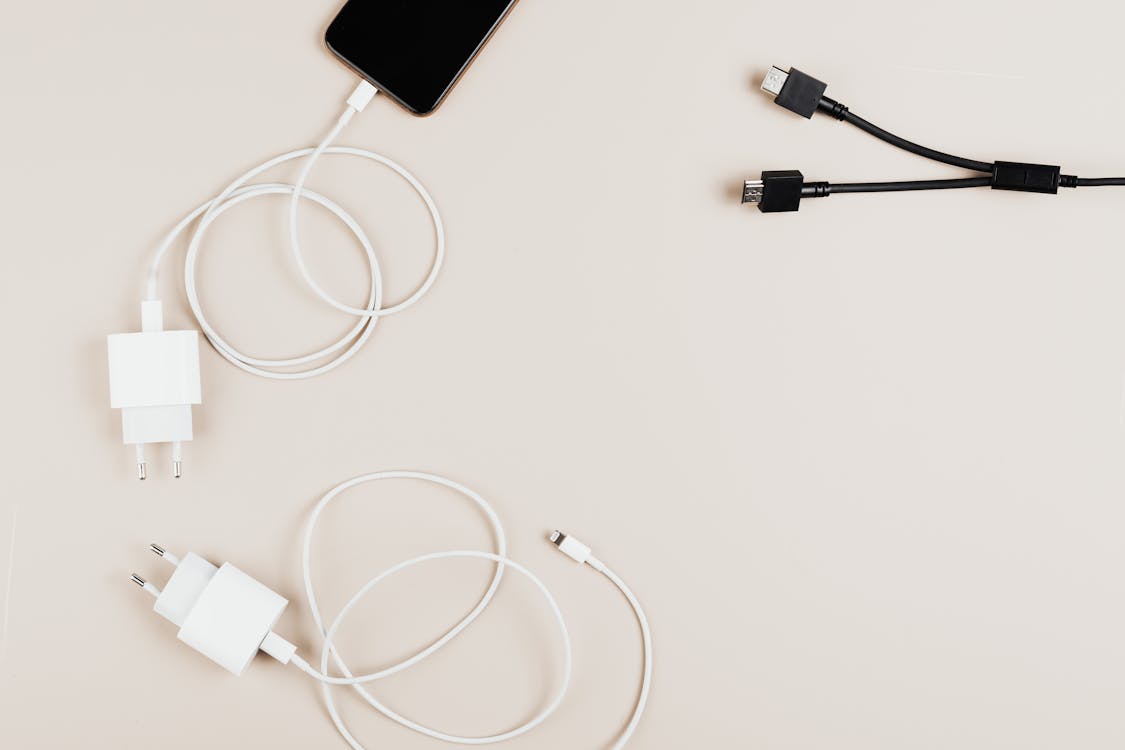 Free Top View of Cables and Chargers on Table Stock Photo
