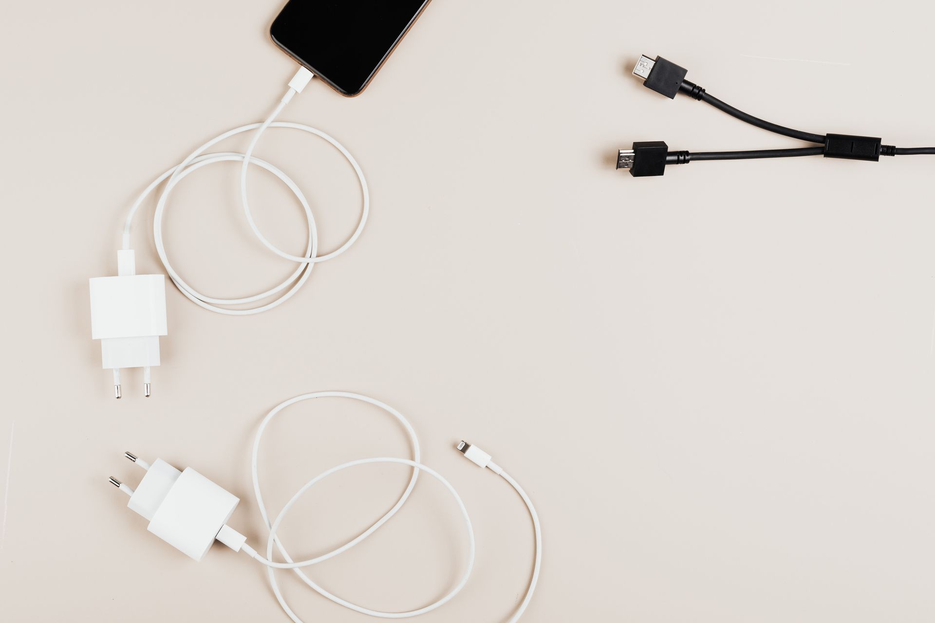 Top View of Cables and Chargers on Table