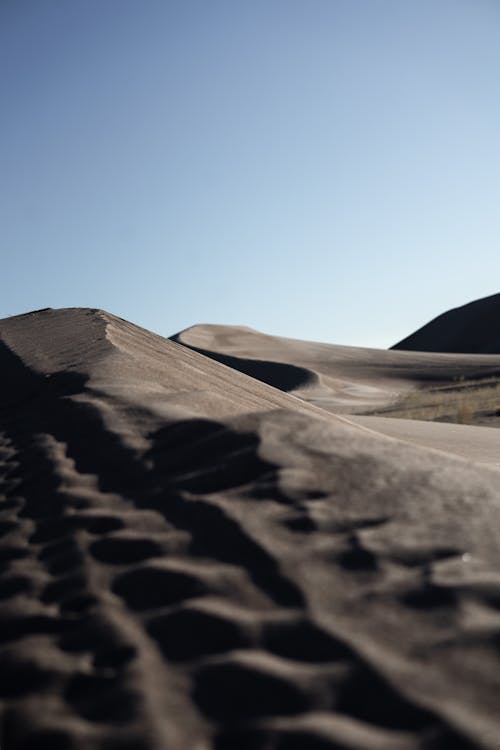 Brown Sand Under Blue Sky