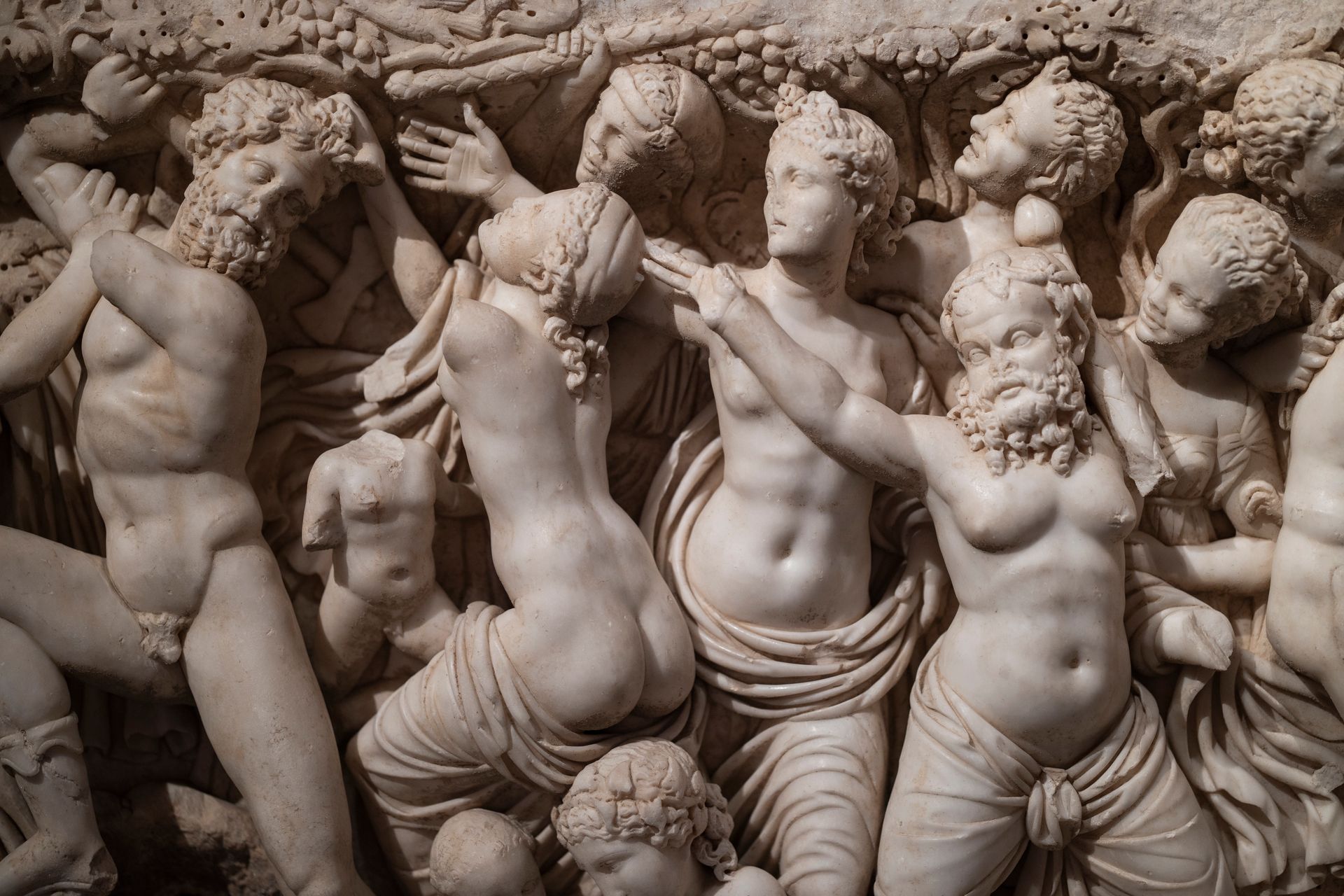A detailed marble sculpture showcasing a dynamic mythological scene from ancient history.