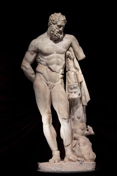 Intricate marble sculpture of Hercules displayed in Antalya Museum, showcasing classical Greco-Roman art.