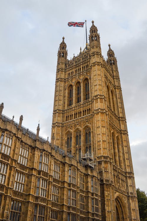 Free The Houses of Parliament with British flag Stock Photo