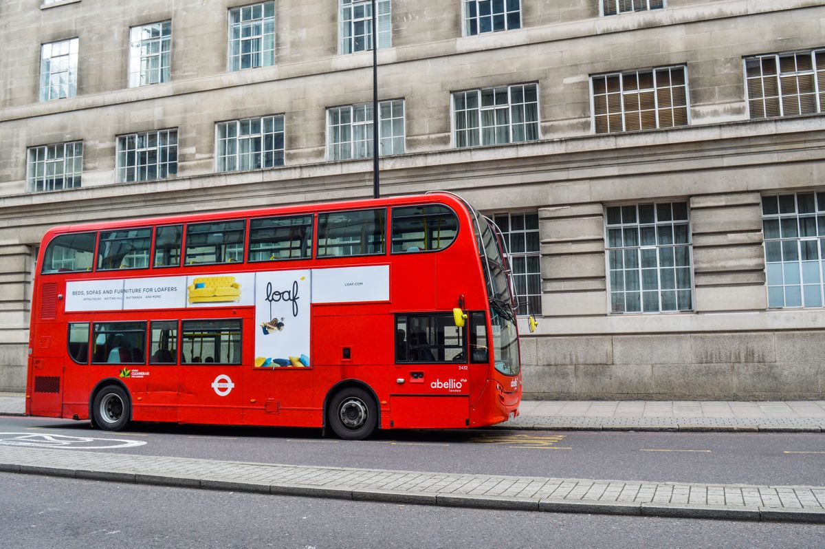 Can I Travel to the UK with a Canadian Passport? 3 Classic red double-decker bus on a London street