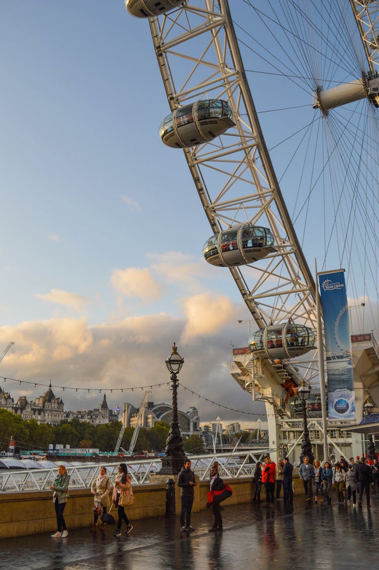 Crowd Of People Near Observation Wheel