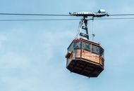Cableway cabin against blue sky