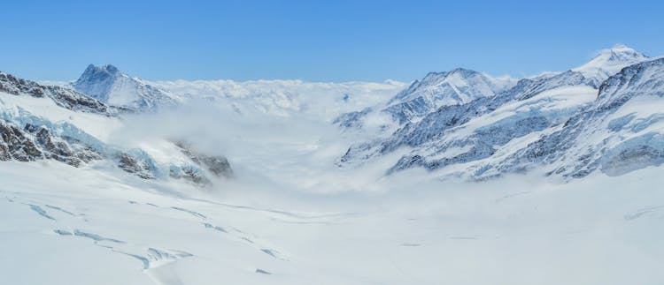 Snowy Mountain Range With Slope