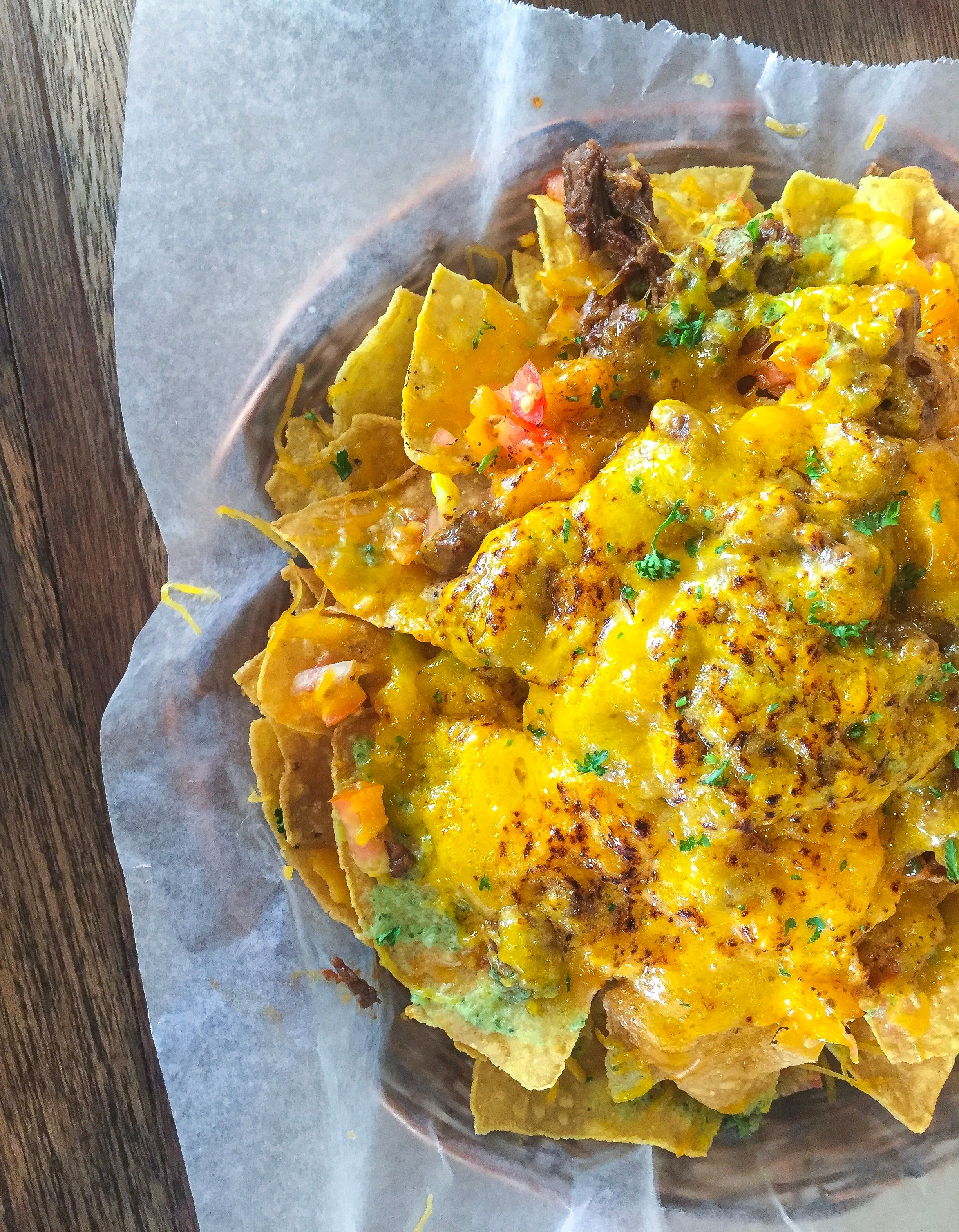 Loaded nachos with melted cheese, a Tex-Mex staple