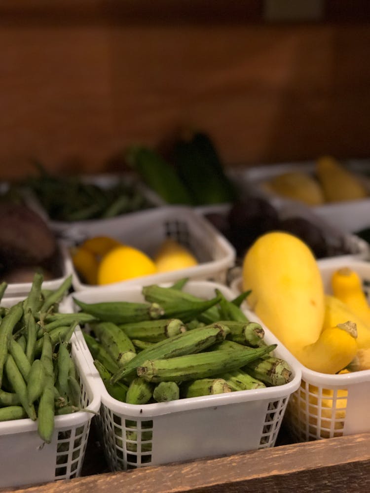 Green Okra Vegetables On Plastic Crates