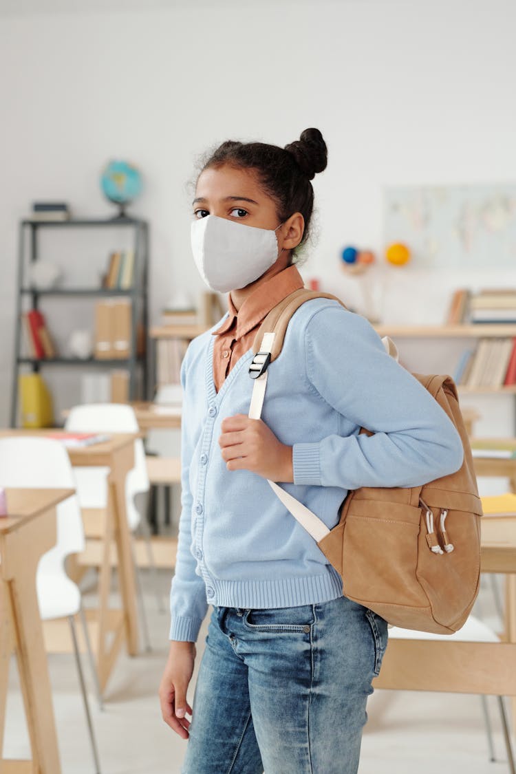 Man In Blue Dress Shirt And Blue Denim Jeans Wearing White Face Mask