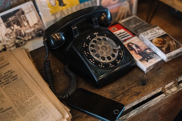 Mobile Phone Next To A Rotary Phone