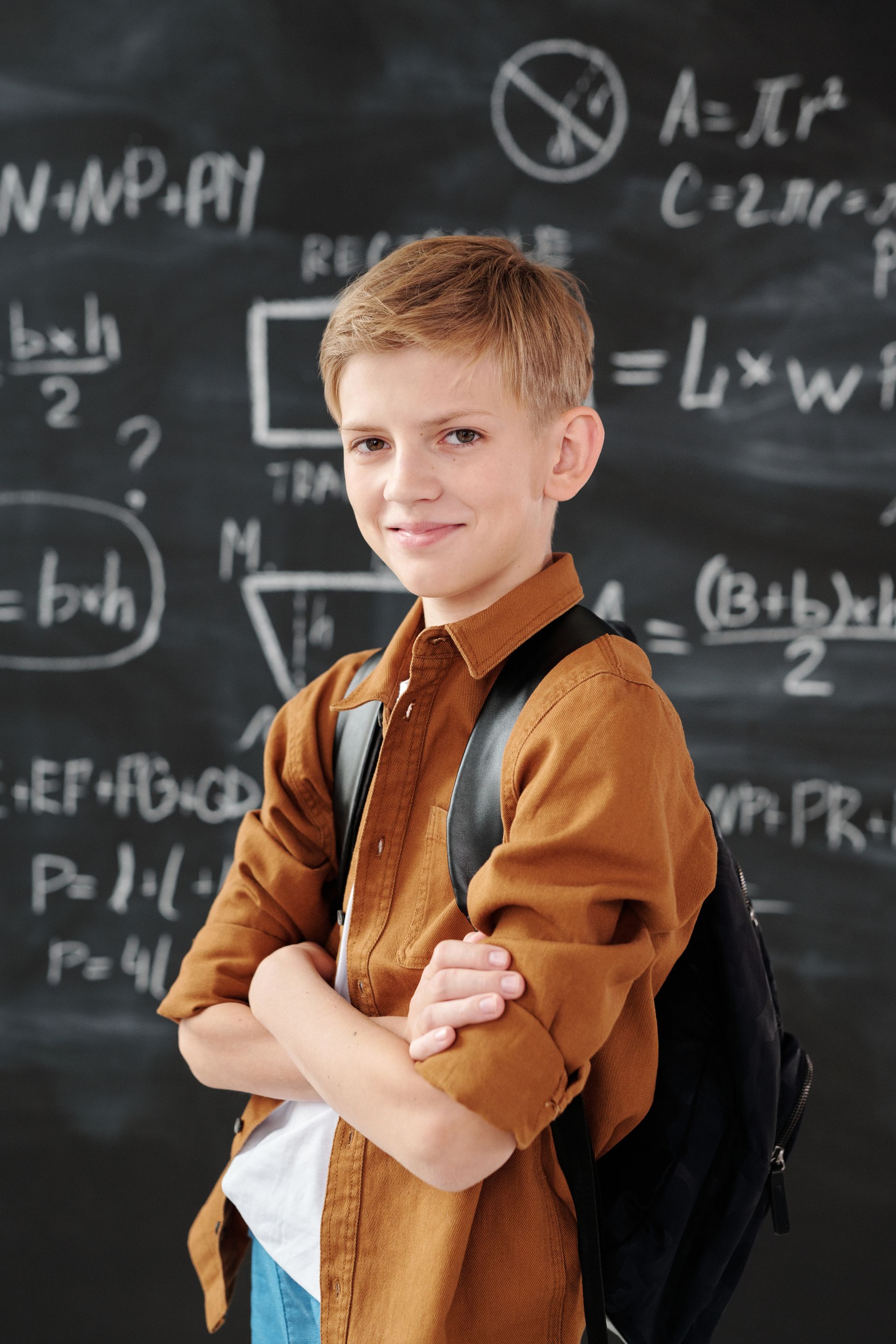 Student working through computer-adaptive private school assessment preparation