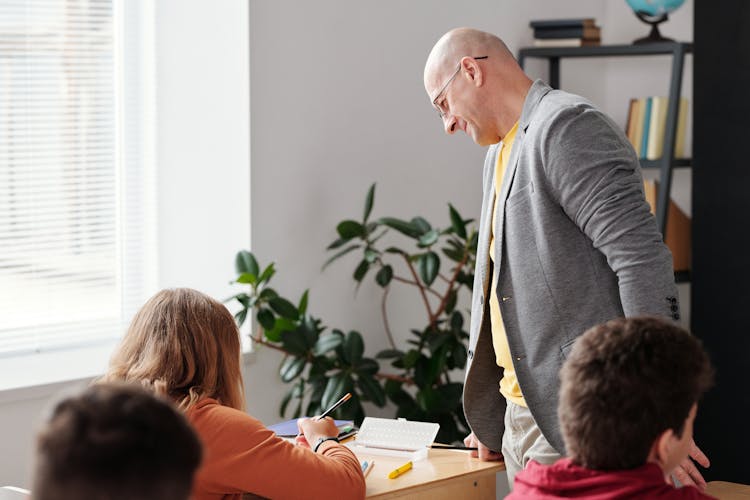 A Teacher Teaching His Student