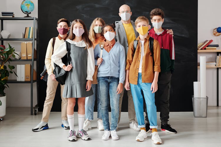 Teacher And His Students Wearing Face Masks