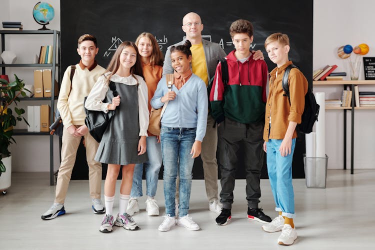 Smiling Students With Their Teacher