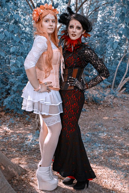 Free Two cosplayers in fantasy costumes posing in a forest near Leipzig. Stock Photo